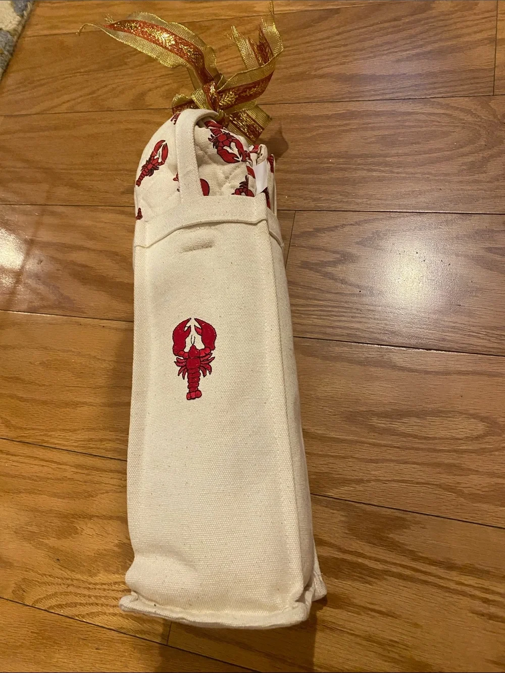 Canvas Lobster Tote with lobster motif items. Red on Cream